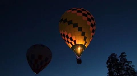 Balloons go up in the night Stock Footage 47174494