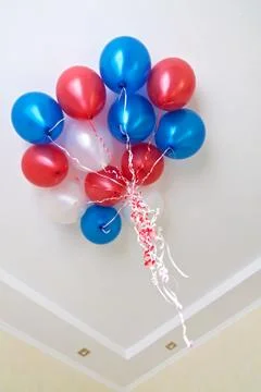 Balloons hanging from the ceiling. Stock Photos