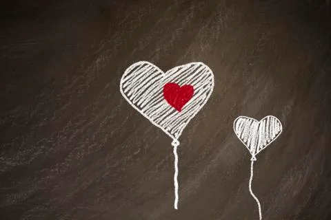Balloons in heart shape form Stock Photos