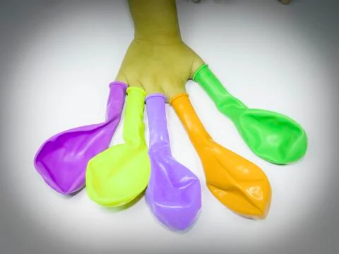 Balloons in human hand Stock Photos