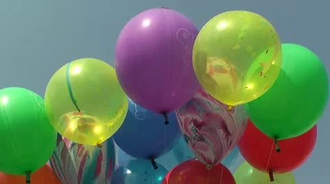 Balloons motion on sky Stock Footage 12110230
