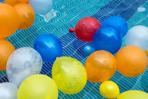 Balloons in a pool Foto stock