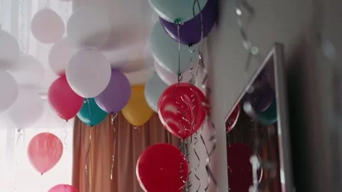 Balloons in a room under the ceiling. Many balls. Stock Footage 131230017