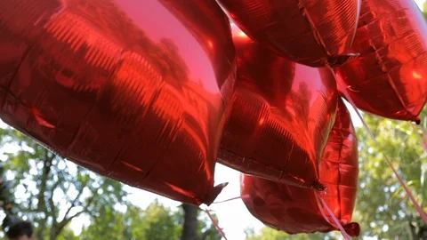 Balloons in shape of Hart Stock Footage 98042470