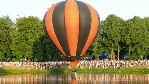 Balloons soar in the evening sky Stock-Footage 113354098
