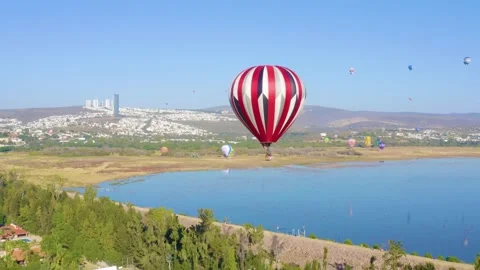 Balloons Soaring Over León Mexico Urban Skyline Stock Footage 321566161