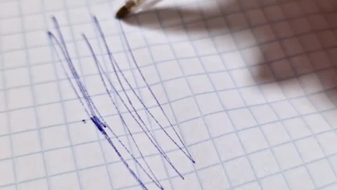 Ballpoint Pen Drawing Blue Scribbles on Graph Paper Stock Footage 321646079