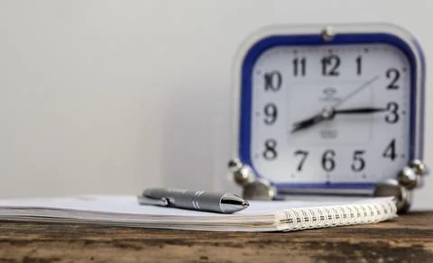 Ballpoint pen on a notebook Stock Photos