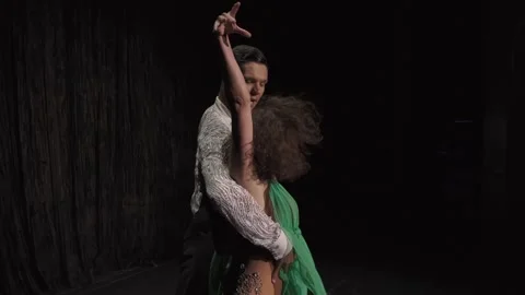 Ballroom pair in Shadow Position, man embraces his partner, she performs full Vídeo Stock 275340864