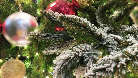 Balls And Light Flashes Illuminations On Branch Of Decorated Christmas Tree Stock Footage 292520094