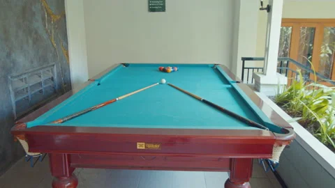 Balls and Two Sticks on A Billiard Table Outside The Resort Stock Footage 161961087