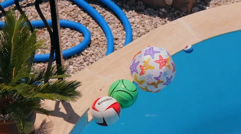 Balls are swimming in the pool Stock Footage 43673235