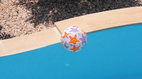 Balls, balls floating in the water in the pool Stock Footage 43045414