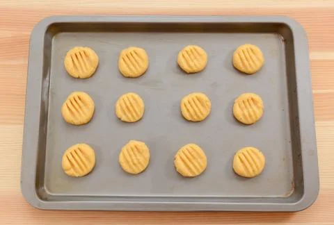 Balls of biscuit dough marked with a fork Stock Photos