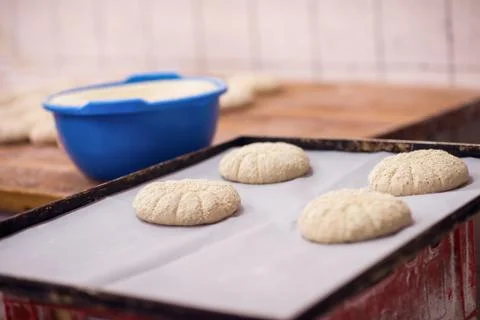 Balls of dough bread getting ready to be baked Stock Photos