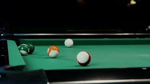 Balls Falling Into Pockets On A Billiard Table Stock Footage 147872996