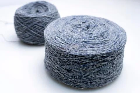 Balls of gray wool on a white background Stock Photos