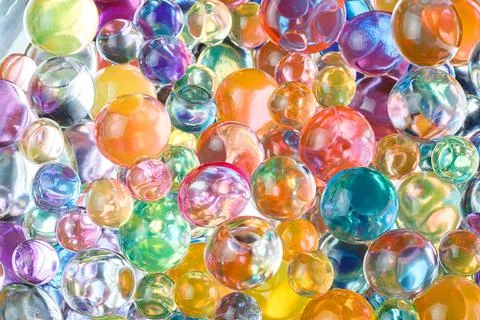 Balls of hydrogel of different colors Stock Photos