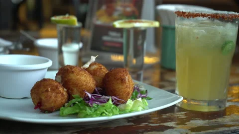 Balls of mashed potatoes hand takes a piece from the plate. Close-up. Stock Footage 167525656