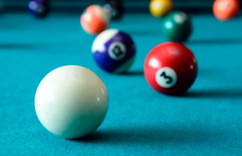 Balls on pool table Stock Photos