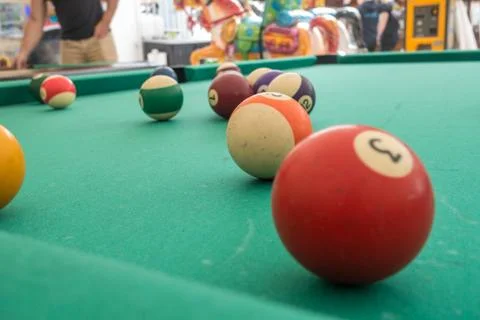 Balls on a pool table. Stock Photos