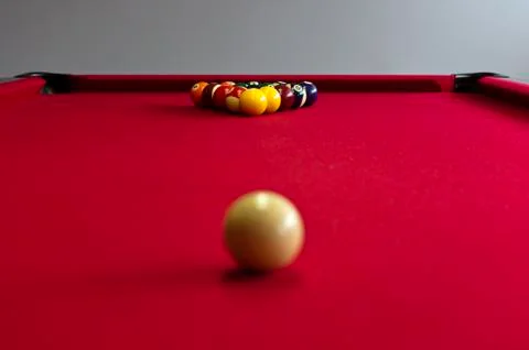 Balls on a red pool table Stock-Fotos