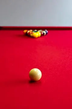 Balls on a red pool table Stock-Fotos