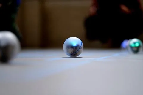 Balls robots on the playing surface of the maze, controlled from the tablet Stock Photos