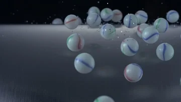 Balls rolling with glitter, Slow Motion Stock Footage 85653478