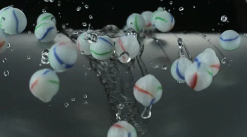 Balls rolling with water, Slow Motion Video stock 31819350