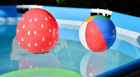 Balls in swimming pool Stock Photos