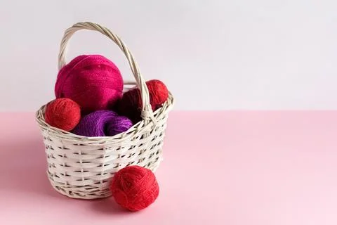 Balls of thread in a basket Stock Photos