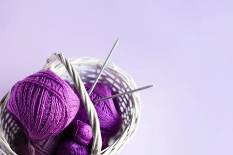Balls of thread in a basket Stock Photos