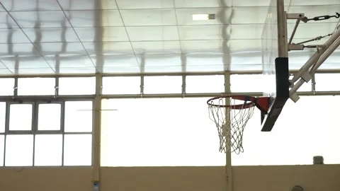 Balls thrown at a hoops overexposed at the backdrop Stock Footage 140380027