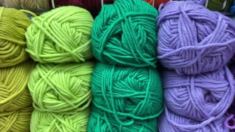 Balls of yarn for knitting. The concept of needlework and knitting. Selective Stock Footage 223574555