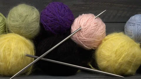 Balls of yarn for knitting of various colors Stock Footage 148174650