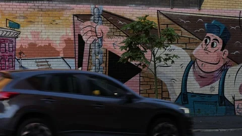 Balmain dock worker mural in Sydney and slow motion traffic 4K Stock Footage 267511802