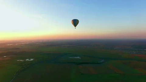 Baloon in the sunset sky Stock Footage 98652234