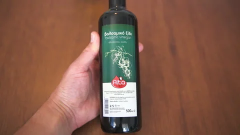 Balsamic vinegar bottle macro closeup, Greek condiment seasoning Stock Footage 271148416