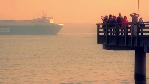 Baltic sea with big ship ferry and Travemunde coast, Germany 스톡 동영상 106176542