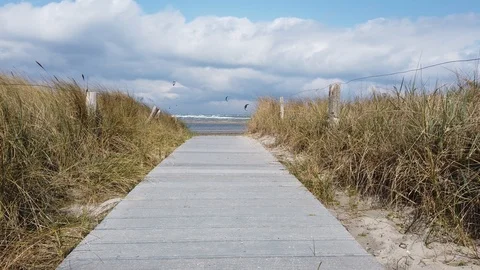 Baltic Sea Entry. Fehmarn with people kitesurfing 스톡 동영상 112921079