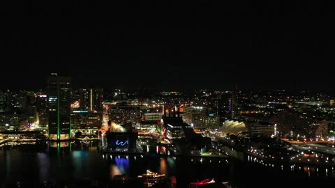 Baltimore-Inner Harbor Fly in Phillips HardRock Night Stock Footage 200787677