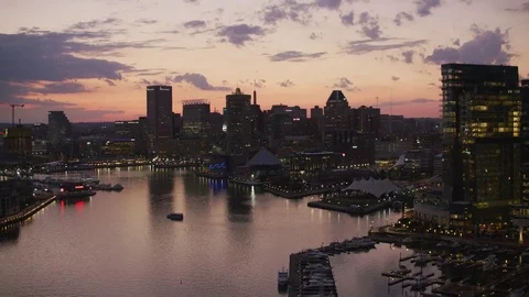 Baltimore, Maryland circa-2017, Flying up inner harbor to downtown Baltimore at Stock Footage