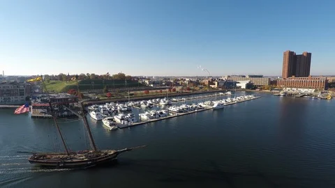 Baltimore MD Aerial, Pride of Baltimore II Sailing into Port 1 Stock Footage 89492374