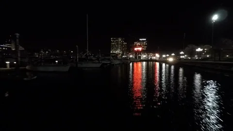 Baltimore MD Aerial, Rusty Scupper Restaurant at Inner Harbor at Night Stock Footage 89755269