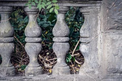 Balusters made of stone on the old historic staircase. Stock Photos