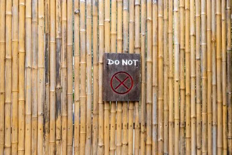 Bamboo background pattern. Do Not enter written on a wooden board. Stock Photos