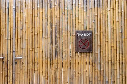 Bamboo background pattern. Do Not enter written on a wooden board. Stock Photos