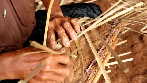 Bamboo basket craftswoman while doing his work in a place, Stock Footage