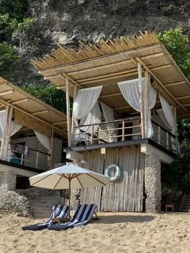 Bamboo beach huts beach setting Stock Photos